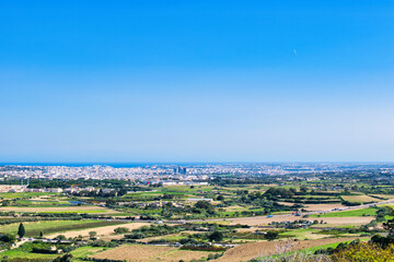 MDINA CITY, MALTA - AUGUST 05, 2021. The Silent City. This was once the Capital City of Malta. The houses are built of sandstone which is traditional for Malta. During summer on a hot sunny morning.