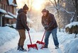 © Creative Clicks - Two men are shoveling snow with red shovels