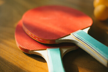 Two ping pong rackets on table