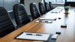 © Ruslan Abdullin - long conference table with several black office chairs around it, each chair paired with a clipboard and pen, set in a modern meeting room with large windows, suggesting an organized and professional