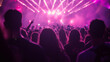 © Tahsin - Crowd enjoying an electrifying music concert with vibrant lights and dynamic atmosphere