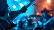 © Shutter2U - Close up of a guitarist playing on stage with blue and orange lights