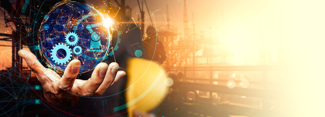 Poster - A human hand holding a digital globe with gears and AI icons, symbolizing artificial intelligence and industrial technology..