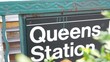 © Dogora Sun - New York subway sign, Queens underground metro station. Metropolitan entrance fence, public transport exit. Long Island city street, NYC United States. Navigation text on signboard. Passenger guidance