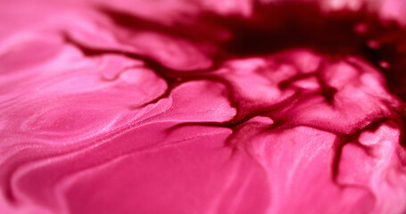 Wall Mural - Ink spill. Wet glitter flow. Defocused magenta pink red color shimmering marble texture paint emulsion spreading abstract art background.
