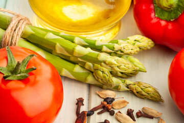 Wall Mural - asparagus bunch on blue background