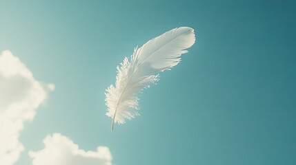 Poster -   White feather flying against blue sky with clouds as background