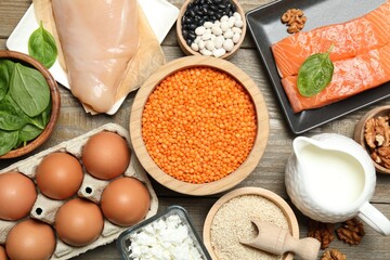 Poster - Different products rich in estrogen on wooden table, flat lay