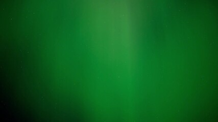 Wall Mural - close up time lapse of multi-colored aurora filling the frame of the star filled night sky