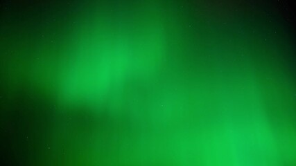 Wall Mural - time lapse of bright green aurora flashing across a star filled sky. only sky included.