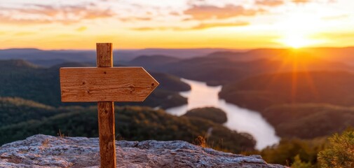 Scenic sunset view over a river with a wooden signpost in the foreground, showcasing nature's beauty and tranquility.