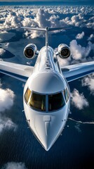 Wall Mural - A white private jet in flight against a blue sky with white clouds