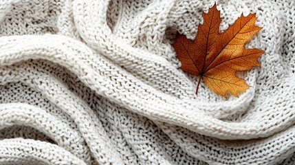 Leinwandbilder - Knitted white scarf pattern background with autumn maple leaf Close up Top view : Generative AI