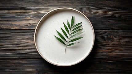 Poster - White plate with palm leaf on wooden background Copy space Top view : Generative AI