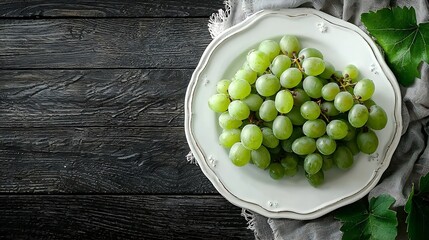 Poster - Green grape on a white plate Grey wooden background Top view Copy space : Generative AI