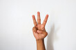 © Rifqi Muflih - Indonesian hand with 3 open finger gesture