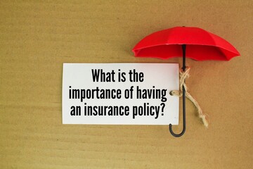 umbrella and white paper with the question What is the importance of having an insurance policy? insurance concept