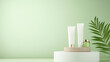 © KayKai - A white and green background with a white and green leaf on a pedestal