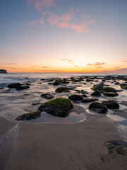 Wall Mural - beautiful dawn view around rocky beach shore.