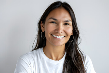 Portrait of native American smiling woman wearing white t-shirt isolated on white background