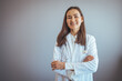 © Dragana Gordic - Confident Female Doctor Smiling in Professional Medical Setting