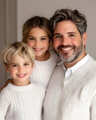 Family portrait with children in matching sweaters