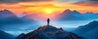 © Nattapat - Breathtaking sunrise scene of a lone hiker silhouetted against majestic mountains, misty valleys, and golden light illuminating the peaks