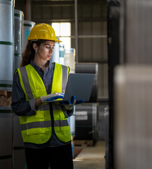 Leader manager staff engineer technician team woman stand hard hat hand holding labtop check quality order discuss working new project business technology produc in workshop industry factory warehouse