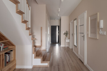 House corridor with entry and staircase