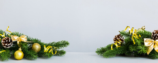 New Year Christmas tree toy, branches of a christmas tree, New Year decorations on a colored background