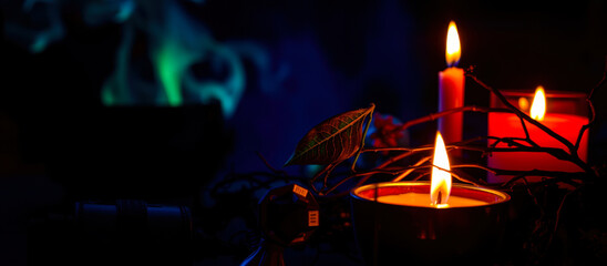 Poster - three candles casting a warm glow the dark