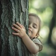 © Ace64 Studio - Nature lover close up of child hands hugging tree with copy space.