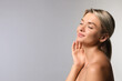 © New Africa - Cosmetology. Beautiful woman with perfect skin on grey background, space for text