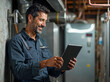 © Mattie - Happy homeowner plumber, HVAC technician, man using a tablet phone in a basement by water heater, burner, duct work. DIY repair or install, happy with work done, quote