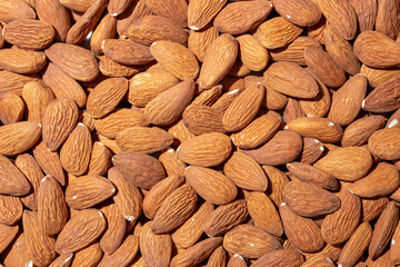 Scattered Almonds. Background from Almond Nuts. Natural High-Calorie Snacks