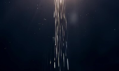 Wall Mural - bright cascading light stream on dark background with sparkles.