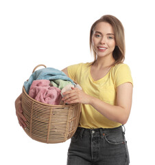 Poster - Happy young housewife with basket full of laundry on white background