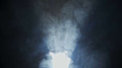 Wall Mural - soft diffused rays of light cut through the hazy darkness.