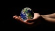 © liu - Hand Held Earth on a Black Background - a powerful and thought-provoking visual. The image emphasizes the fragility and beauty of our planet against a stark backdrop.