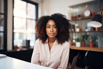 Portrait of a young hipster African American woman in modern office