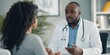 © CreativeSeven  - Doctor consulting with a patient about their test results, explaining medical terms and treatment options.