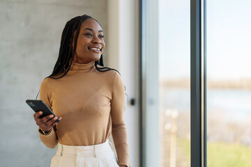 Confident Black Businesswoman in Chic Office Attire