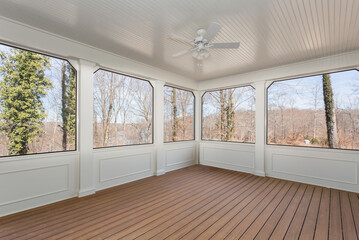 Spacious Modern Sunroom With Scenic Outdoor Views