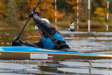 kayak slalom canoe race in river. kayaking with colorful canoe kayak boat. paddling, process.