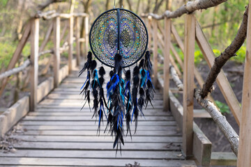Wall Mural - Handmade dream catcher with feathers threads and beads rope hanging