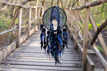 Wall Mural - Handmade dream catcher with feathers threads and beads rope hanging