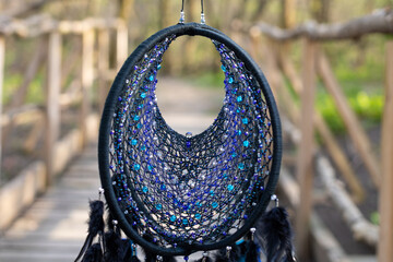 Wall Mural - Handmade dream catcher with feathers threads and beads rope hanging