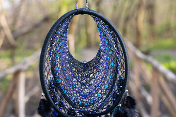 Wall Mural - Handmade dream catcher with feathers threads and beads rope hanging