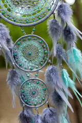 Wall Mural - Handmade dream catcher with feathers threads and beads rope hanging