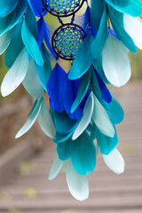Wall Mural - Handmade dream catcher with feathers threads and beads rope hanging